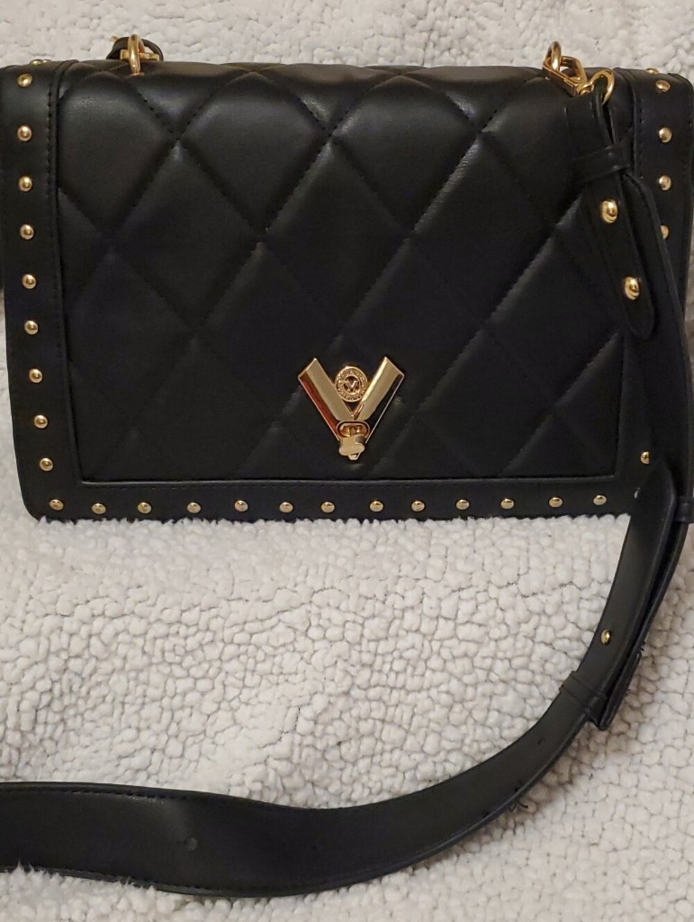 Black Quilted Crossbody Bag with Gold Accents